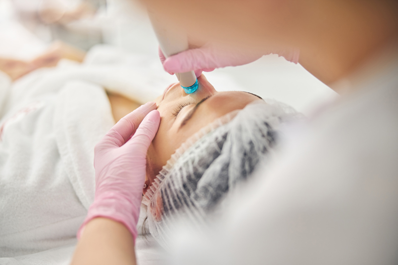 A photo of laser hair removal on a knee